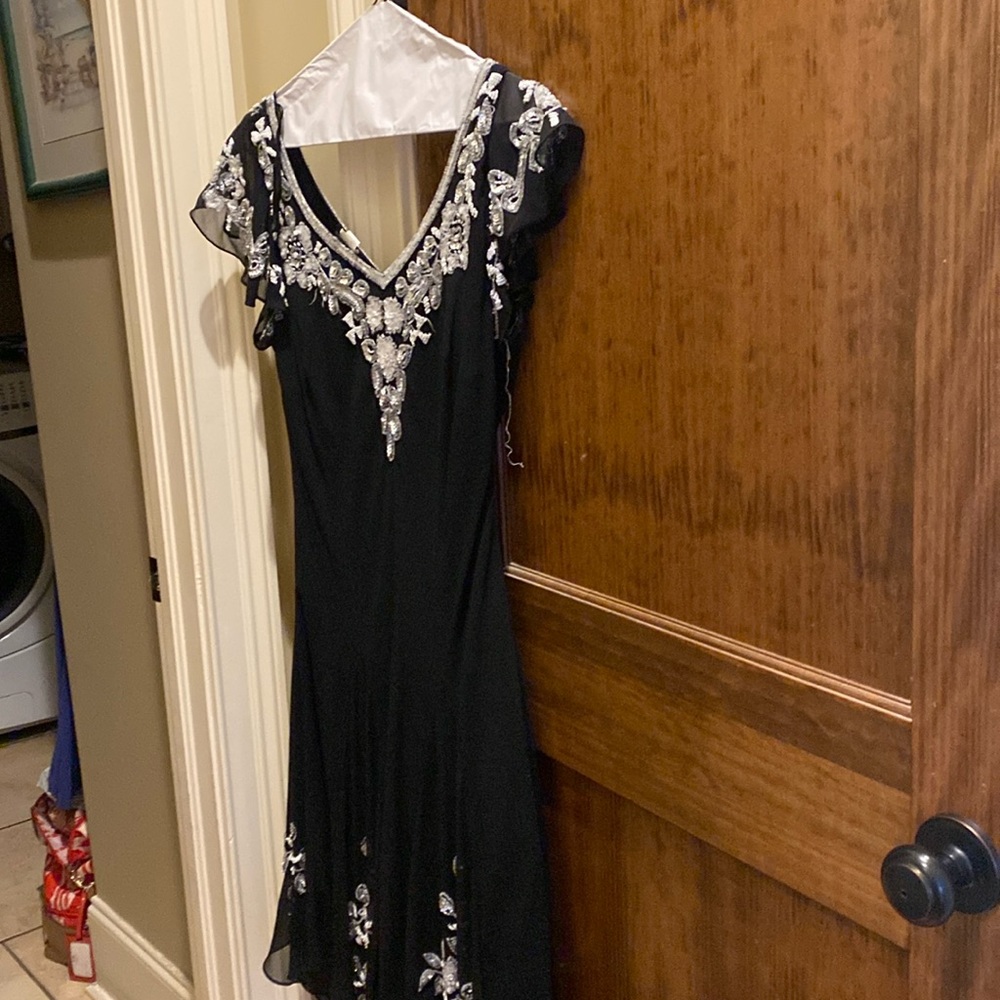 Black cocktail dress with handkerchief bottom and beaded top